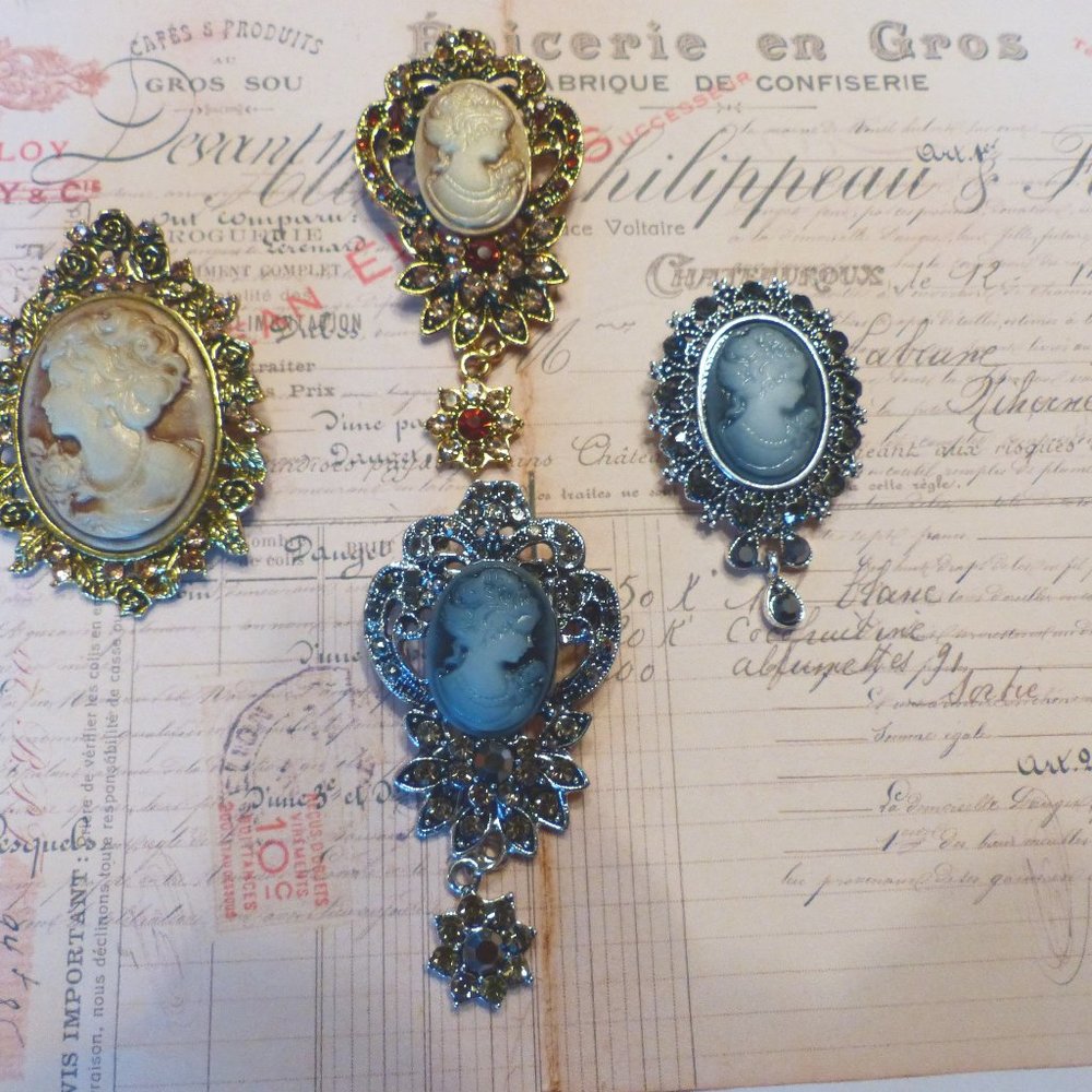 RHINESTONE CAMEO LOT#3--------4 UNIQUE BROOCHES INCLUDED --- GORGEOUS